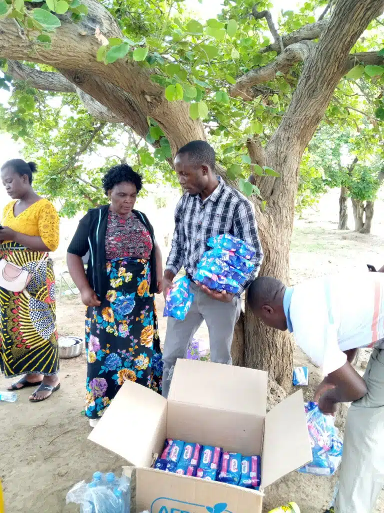 Live Well Zambia distributing AFRIpads Schoolgirl Kit in Zambia