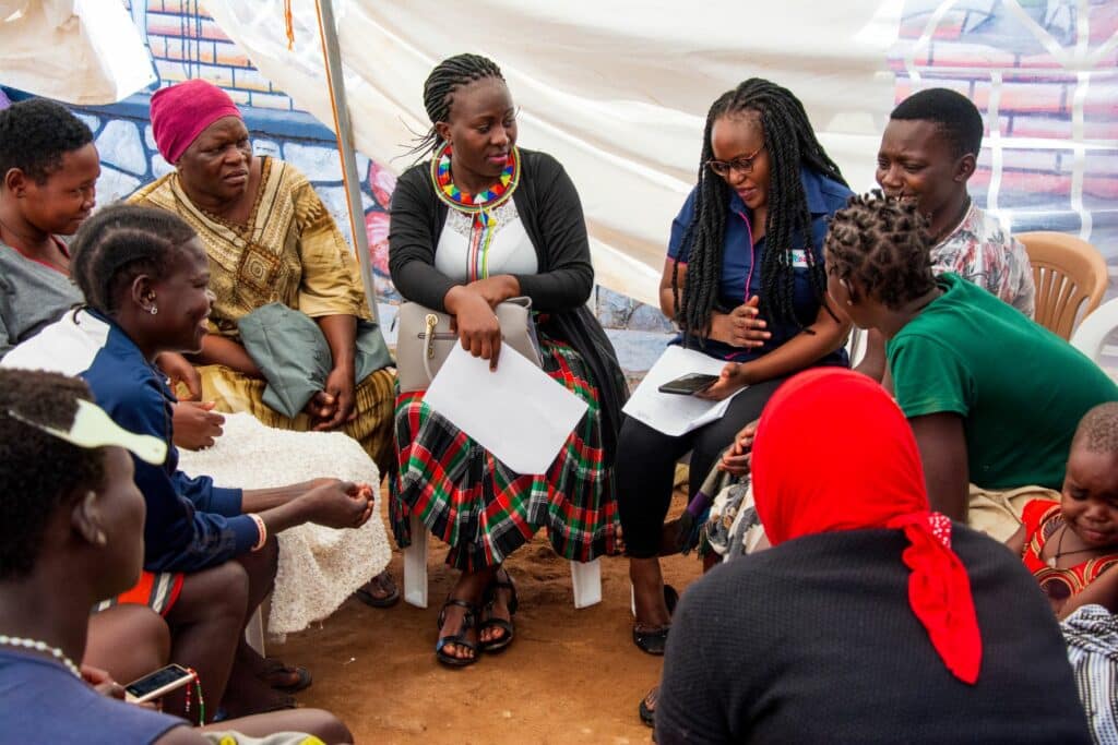 Karimojong homeless girls sharing their opinions on menstruation during International Day of the Girl Child 